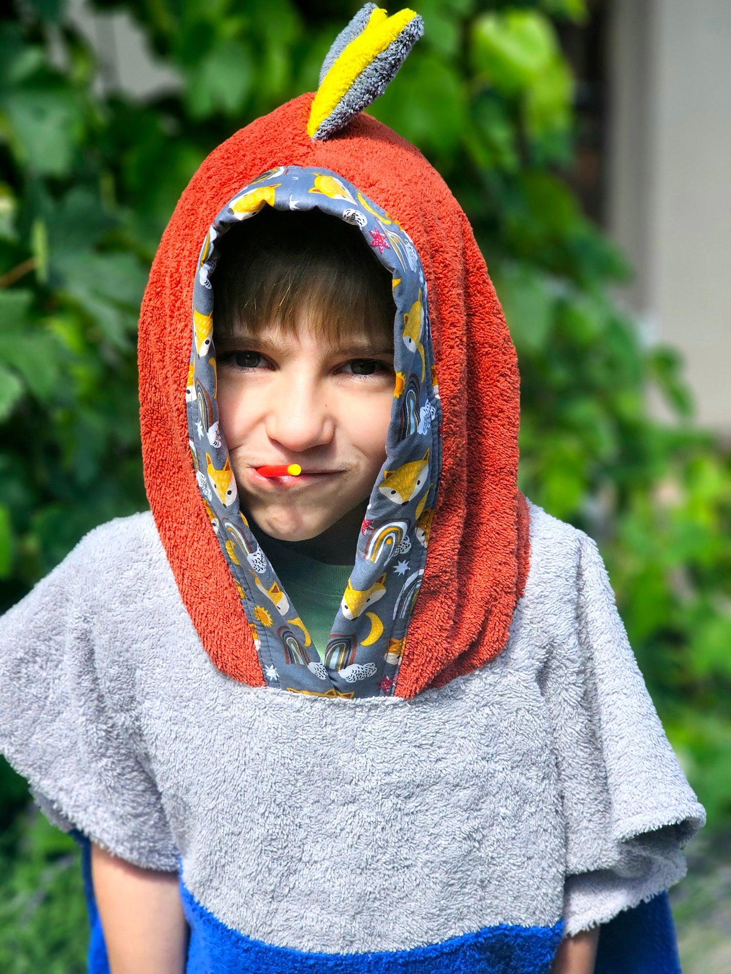 Krāsains DINO Pončo